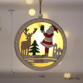 Nordic wooden light-up Christmas ornament with Santa and reindeer scene, 12x11cm - Red Santa Claus