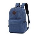Vintage denim blue canvas backpack with brown leather diamond patch and side pockets - Vintage Blue