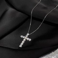 Sparkling silver stainless steel cross necklace with clear zircon stones on black silk - Silver