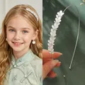 Elegante zilveren haarband met schelpenblaadjes en glanzende strassteentjes - Zilver Tarwe-oor Blad Kattenoog