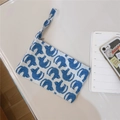 Macro detail of cotton pouch featuring blue abstract cat prints and zipper closure - Blue Cat