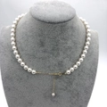 Detailed view of white pearl necklace with gold lobster clasp and adjustable extension chain - 14K Gold Filled 8mm (38+7cm)