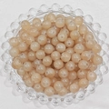 Detail of round champagne glass beads in a clear tray for DIY jewelry making - 6mm / Khaki