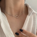 Elegant silver bow-tie necklace with irregular oval ring pendant on a fine box chain - Silver Irregular Oval Necklace (XL1207)