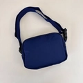 Detail of navy blue nylon waist bag with adjustable strap and sturdy plastic buckle - 21*15*6cm / Dark Blue