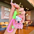 Cute Hello Kitty pink liquid glitter keychain with silicone wristlet and gold bell - Pink Luminous Hello Kitty Car Style