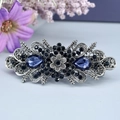 Pince à cheveux vintage argentée avec strass bleu foncé et gravure de fleurs - Radiant