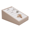 Tiered beige jewelry display tray with white slots for ring and brooch storage - Champagne