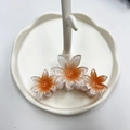 Pinza per capelli con tre fiori di frangipane e petali sfumati arancioni trasparenti - Girasole / 9.5CM / Arancione