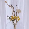 Handmade dried flower bouquet with lavender and yellow blossoms in clear glass vase - Grapefruit