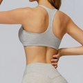 Heather grey racerback sports bra with matching high-waisted yoga leggings on model - White Brown