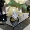Silver pear-shaped cubic zirconia ring featuring a halo setting and paved band on black surface - Jz885【white Diamond】ljz-211 / Adjustable Open