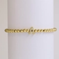Minimalist 18k gold plated beaded elastic bracelet featuring a micro-paved letter A charm - Letter A