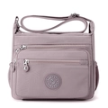 Lightweight mauve waterproof nylon crossbody bag with adjustable strap and multi-pocket design - Elegant Purple