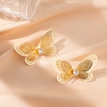 Elegant gold hollow butterfly earrings featuring a central crystal on champagne silk - Double Wing Butterfly