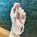 Elegante kralen telefoonkoord met kristallen strass ballen en witte parels hanger charm - Roze