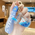 Blue creative liquid oil keychain featuring a mini sailboat charm and bubble strap - Sapphire Blue Sailboat - Milk Tea Cup