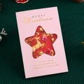 Pink Christmas card with star cutout and gold reindeer design on green background - Light Pink Christmas Star - Greeting Card