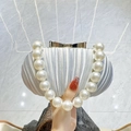 Elegant pearl handle shell-shaped dinner clutch bag with pleated texture in pearl white - Silver