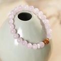 Close-up of pink beaded bracelet with golden spacer beads on a ceramic bottle neck - Kunzite Cook Beaded Bracelet (Exquisite Gift Box)