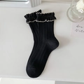 Black Lolita calf socks featuring contrasting white ruffle trim and ribbed texture - Black with White Trim