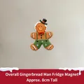 Gingerbread man magnetic fridge sticker with green suspenders and black hat height 8cm - Overalls Gingerbread Man