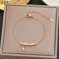 Elegant gold bamboo segment bracelet with leaf charms in stainless steel material - Gold Bamboo Leaf Style (5100)