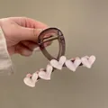 Brown translucent hair claw clip with pink marble heart charms and gold spring - 8cm / Pink