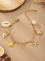 Golden ocean theme bracelet with shell, starfish, and letter Q charms on beach decor - Letter Q(Q)