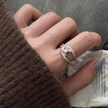 Silver multi-strand twisted rope butterfly ring with enamel on female hand - Intertwined Twist