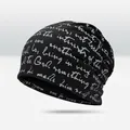 Black slouchy beanie with white handwritten print, soft cotton blend knit hat for men - All-over Script Print Style / Black