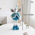Blue plush Christmas reindeer doll with long legs standing 50cm tall on a white table - Blue Telescopic Reindeer