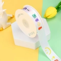 White polyester ribbon with cute smiley faces and text on a specialized roll - Childlike Innocence