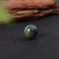 Polished 16mm natural green agate gemstone sphere with mixed smooth mineral textures - Moss Agate