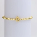 18k gold-plated beaded elastic bracelet featuring a minimalist 3D letter R pendant - Gold R