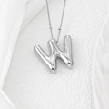 Detail shot of the 3D silver bubble letter W pendant on a beaded silver chain - Letter W Pendant