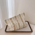 Close-up of floral cotton linen makeup bag with a minimalist simple wish label - Orange Striped Floral Cosmetic Bag