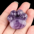 Natural purple amethyst carved cat paw stone crystal figurine held in hand - Amethyst