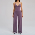 Women's dark purple sports yoga set featuring a slim fit V-neck top and wide-leg pants - S / Purple
