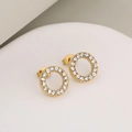 Elegant gold round stud earrings with white cubic zirconia in a minimalist style - Stud Earrings / Gold + White Stone