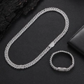 Detail of silver Cuban link necklace and bracelet set with double row zircon stones - 24 Inch Necklace / White Gold