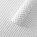 White waterproof wrapping paper with 3D embossed polka dot pattern in a rolled display - Puff Relief Paper - Cream White