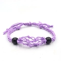 Detail of purple hand-woven adjustable net bracelet with black decorative beads - Bracelet / Purple
