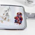 Mini pinza de pelo de acetato con colorido patrón floral sobre espejo de plata - Arcoíris