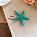 Blauwgroene zeester haarspeld met roze glitterbasis voor een strandvakantie look - Teal zeester-Roze clip