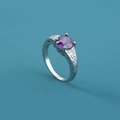 Silver ring with round purple gemstone and white zircon accents on blue background - Adjustable Open / Large Purple Round Gem/White Accents
