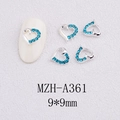 Macro detail of blue crystal heart nail charm with silver alloy frame and 9x9mm size - Dark Blue Hollow Style(A361)