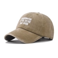 Detail of washed khaki cotton cap showing vintage slogan print and six-panel construction - Adjustable / Khaki