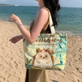 Canvas tote bag with cute cartoon hedgehog print and tropical leaves on beach background - Hedgehog