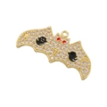 Détail du pendentif chauve-souris doré avec zircons et motifs de visage souriant - Or Zircone Blanc Yeux Rouges Fantôme Noir Chauve-souris